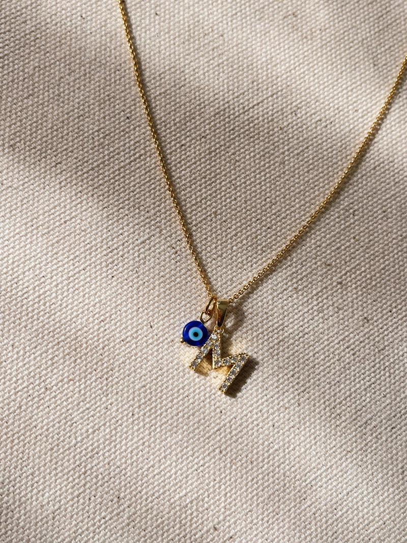 Dainty Ojitos Initial (Solid Gold)